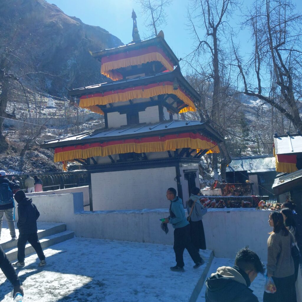 Muktinath Temple blanketed in snow during winter, offering a tranquil and divine atmosphere in the heart of the Himalayas.