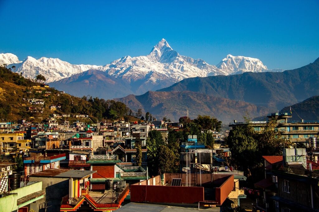 View of Fishtail Mountain (Machhapuchhre) from a hotel balcony in Pokhara, showcasing a peaceful morning scene with clear skies—one of the best places to visit in Pokhara.