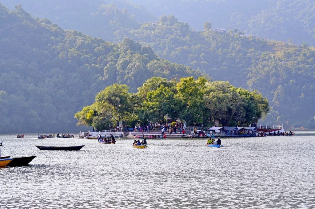Tranquil reflections on Phewa Lake, with the majestic Annapurna range watching over Pokhara.