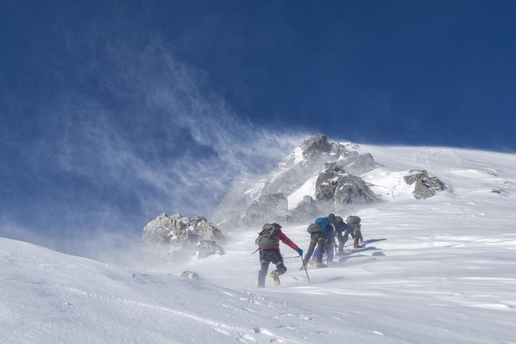trekking-trials-of-nepal-min The trials are covered with snow and the trekkers are struggling to walk.