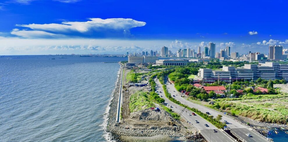 Bustling cityscape of Manila showcasing a mix of modern skyline and historic charm—also featured as the main image for the Philippines Tour Packages from Manila.