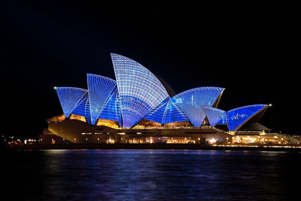 sydney-opera-house-australia Sydney Opera House in Australia, iconic architectural landmark on Sydney Harbour with blue skies.